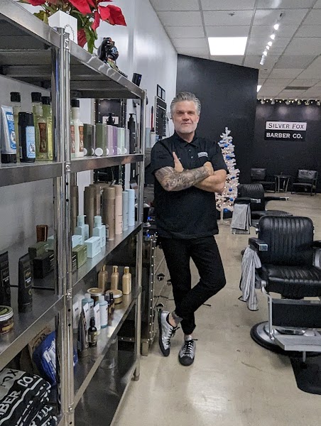 Silver Fox barber at work on a gentleman's cut